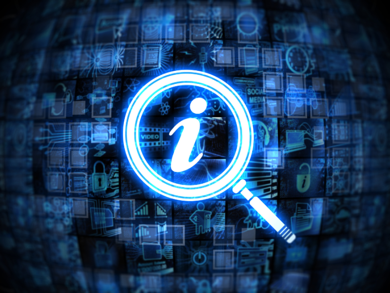 Forstørrelsesglas og informationsikoner.